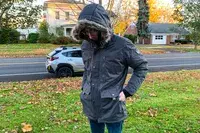 A person with the hands in the pockets of the Kuhl Men