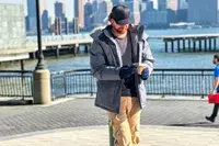 A person walks outside while wearing the L.L. Bean Men