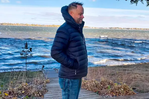 A side view of a person wearing the Stio Men