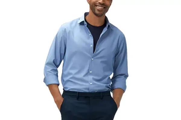 A person places their hand inside the pocket of the Aday Turn It Up Pants