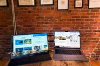 Opened ARZOPA Portable Monitor next to an opened macbook pro.