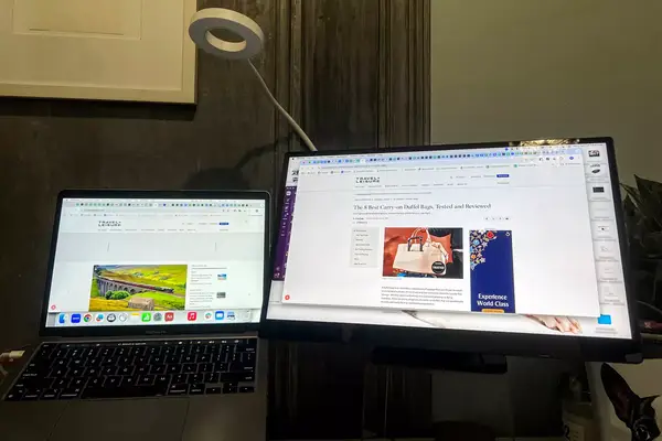 Portable monitor and laptop on a desk