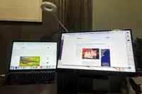Portable monitor and laptop on a desk