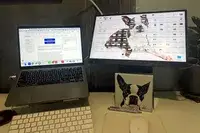 Portable monitor and laptop on a desk