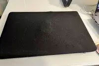 Clothed covering MSI Pro MP161 E2 Portable Monitor.