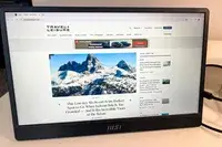 Clothed covering MSI Pro MP161 E2 Portable Monitor.