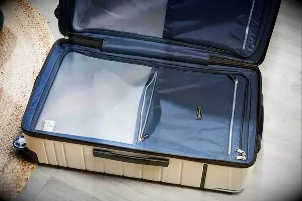 An opened Travelpro x Travel & Lanetrek Large Check-In Trunk Spinner