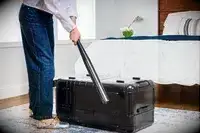 A person hits the Monos Aluminum Trunk with a baseball bat