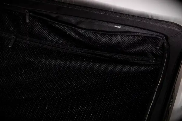 Closeup of an interior mesh pocket in the Away The Trunk