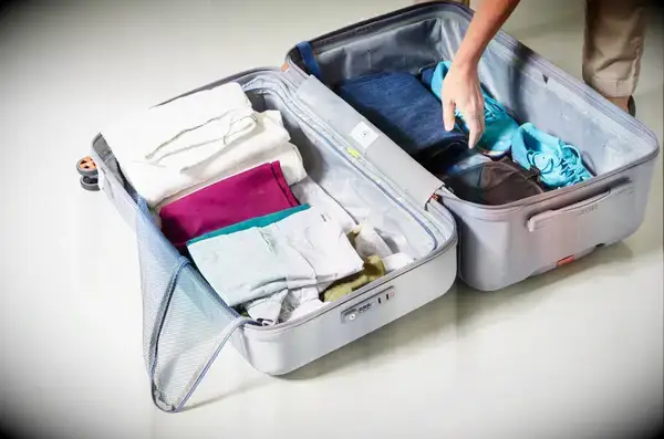 A packed Delsey Paris Cruise 3.0 26 Inch Trunk