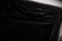 Closeup of an interior mesh pocket in the Away The Trunk