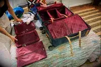 Travel bags and clothing that fit inside the Hartmann Reserve Medium Expandable Trunk