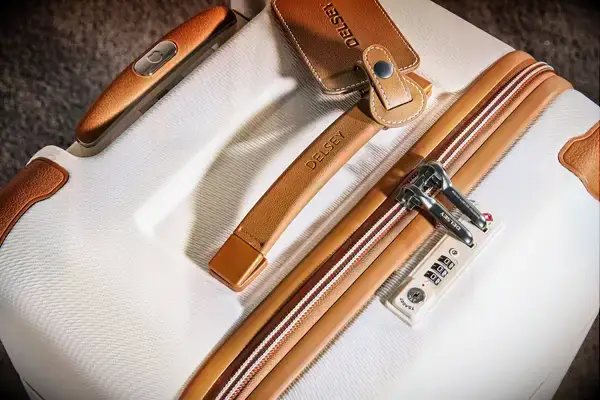 Delsey Paris Chatelet Air 2.0 26 Inch Trunk from a top angle showcasing the Delsey logo