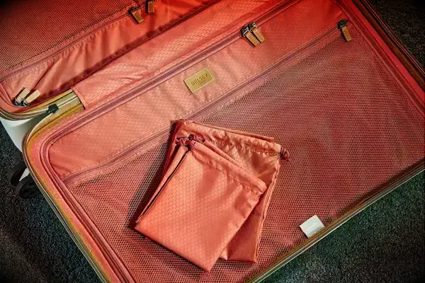 A close up of an empty Delsey Paris Chatelet Air 2.0 26 Inch Trunk compartment