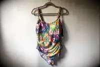 The La Blanca Island Goddess Lingerie One-Piece Swimsuit hangs on a hanger