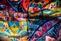 A close-up of the La Blanca Island Goddess Lingerie One-Piece Swimsuit fabric