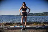 A front view of a person wearing the Sheila Nellie Scoop Bikini Top and Sheila Grace Mini Swim Short