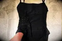 A person with their hand in the La Blanca Island Goddess Lingerie One-Piece Swimsuit