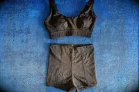 The Sheila Nellie Scoop Bikini Top and Sheila Grace Mini Swim Short on a towel