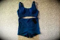 The Sheila Nellie Scoop Bikini Top and Sheila Grace Mini Swim Short on a rug