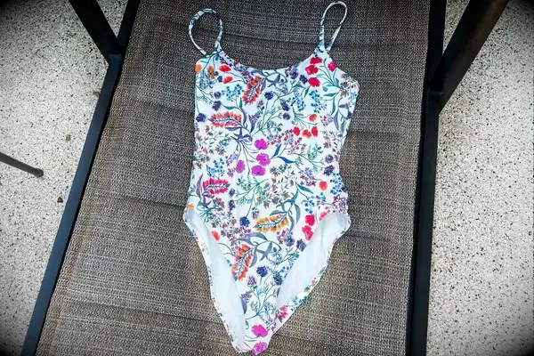 The Andie The Amalfi swimsuit on a lounge chair