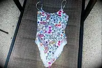 The Andie The Amalfi swimsuit on a lounge chair