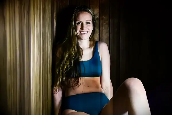 Woman in a sauna wearing a Patagonia Women