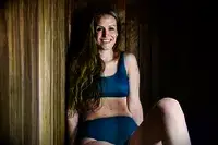 Woman in a sauna wearing a Patagonia Women