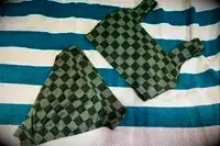 The Albion Olivia Swim Crop Swimsuit Top and Albion Almost Cheeky Swimwear Bottoms on a towel