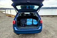 The Hydrus Paradise Touring Inflatable Paddle Board packed in its travel case while packed in a car