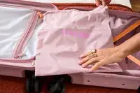 A hand on an empty Beis Mini Roller