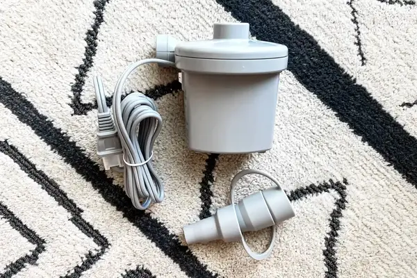 The electric air pump for the SlumberPod Slumber Tot Inflatable Toddler Bed
