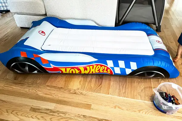 The Funboy Kids Sleepover Air Mattress on a wooden floor