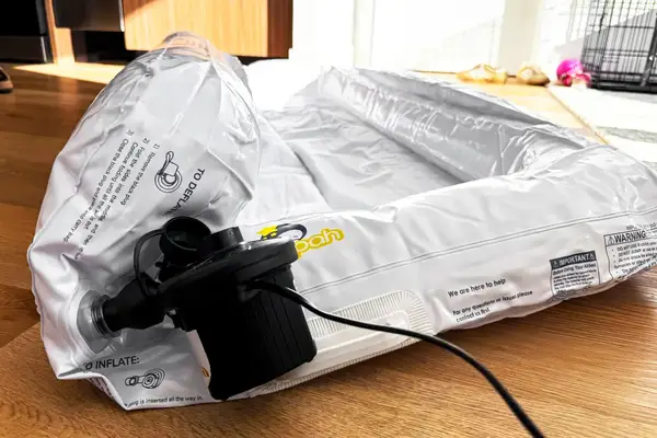 The Sleepah Inflatable Toddler Travel Bed is inflated using an electric air pump