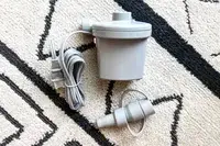 The electric air pump for the SlumberPod Slumber Tot Inflatable Toddler Bed