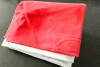 The folded Sleepah Inflatable Toddler Travel Bed 