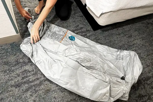 The SlumberPod Slumber Tot Inflatable Toddler Bed is unfolded and inflated