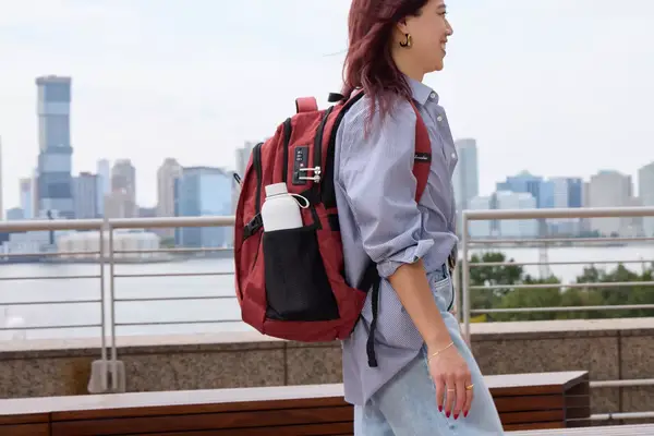 A person wears the SHRRADOO Anti Theft Laptop Backpack on their back