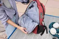 A person holds the SHRRADOO Anti Theft Laptop Backpack open