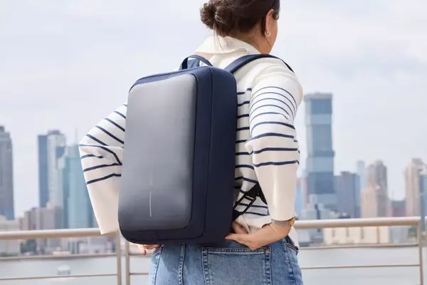 A person wears the XDDesign Bobby Bizz 3-in-1 Anti-Theft Backpack & Briefcase