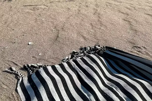 Fairmont Turkish Linen Towel on a beach