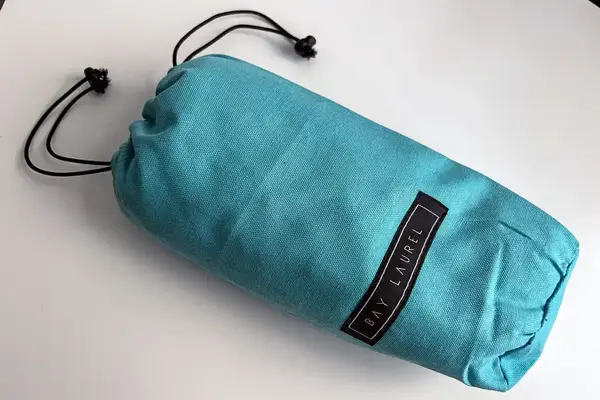 The Bay Laurel Turkish Beach Towel inside of the Travel Bag