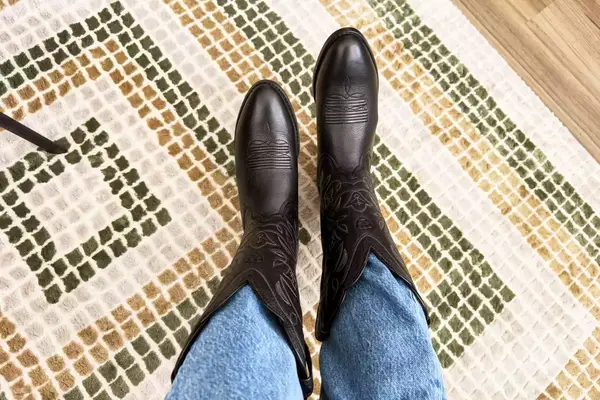 An overhead view of a person wearing the Ariat Heritage R Toe Western Boots