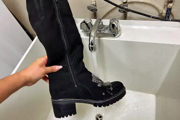 A hand holds a Overland Women