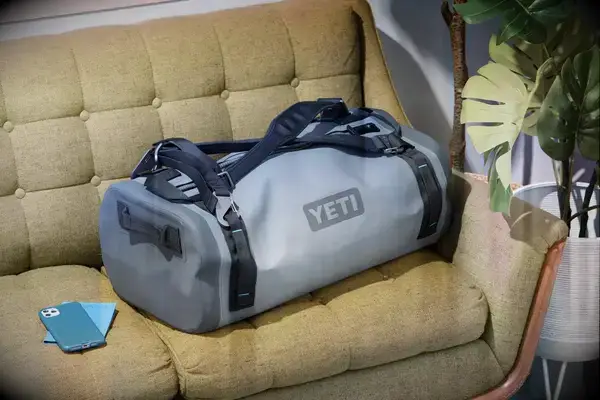 Yeti Panga Waterproof Duffel on a couch