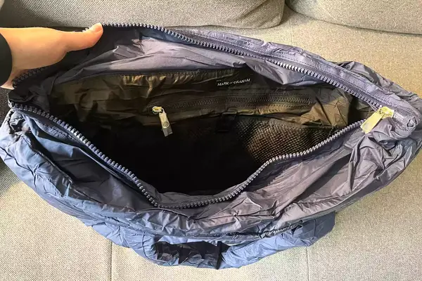 The inside of a navy puffer tote bag