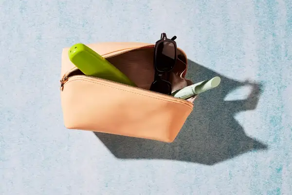 Top-down view of the Mark & Graham Fillmore Vegan Diamond Travel Pouch