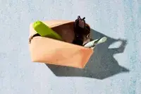 Top-down view of the Mark & Graham Fillmore Vegan Diamond Travel Pouch