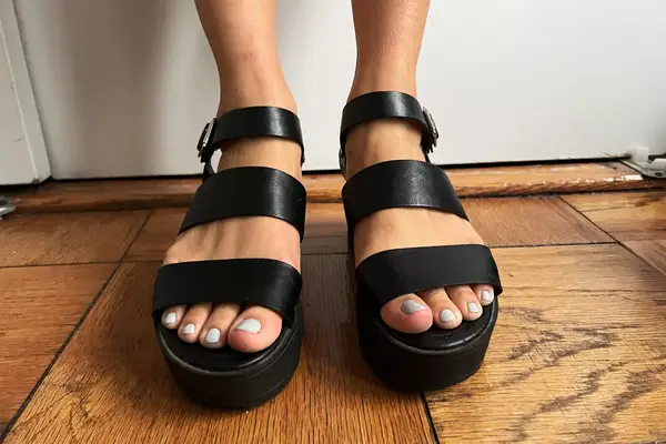 Feet wearing the Soda Open Toe Block Heels
