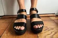 Feet wearing the Soda Open Toe Block Heels